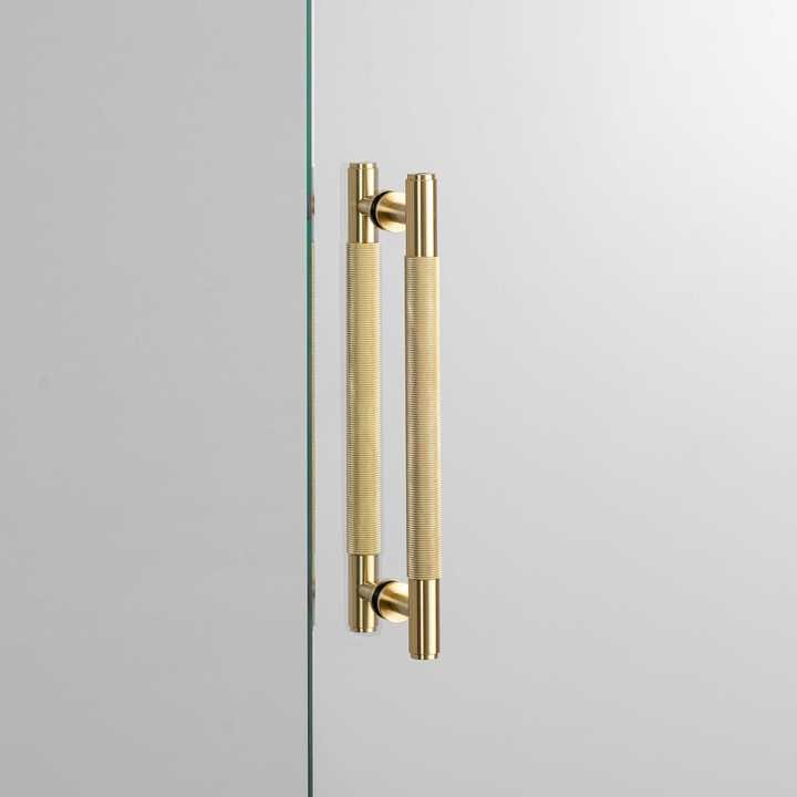 Uchwyt Meblowy PULL BAR Double-Sided na szklanych drzwiach