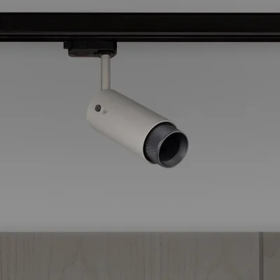 Avgasstrålkastare med korsspår, stålgrå med bränd brons