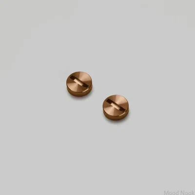 Dekorationsset med kors i stålram och varm solnedgångsdetalj